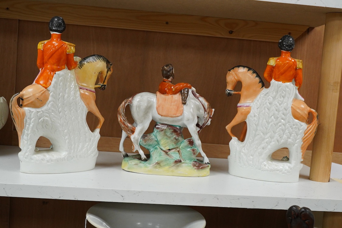 Three Staffordshire flatback figures of Garibaldi, mid 19th century, largest 29cm high